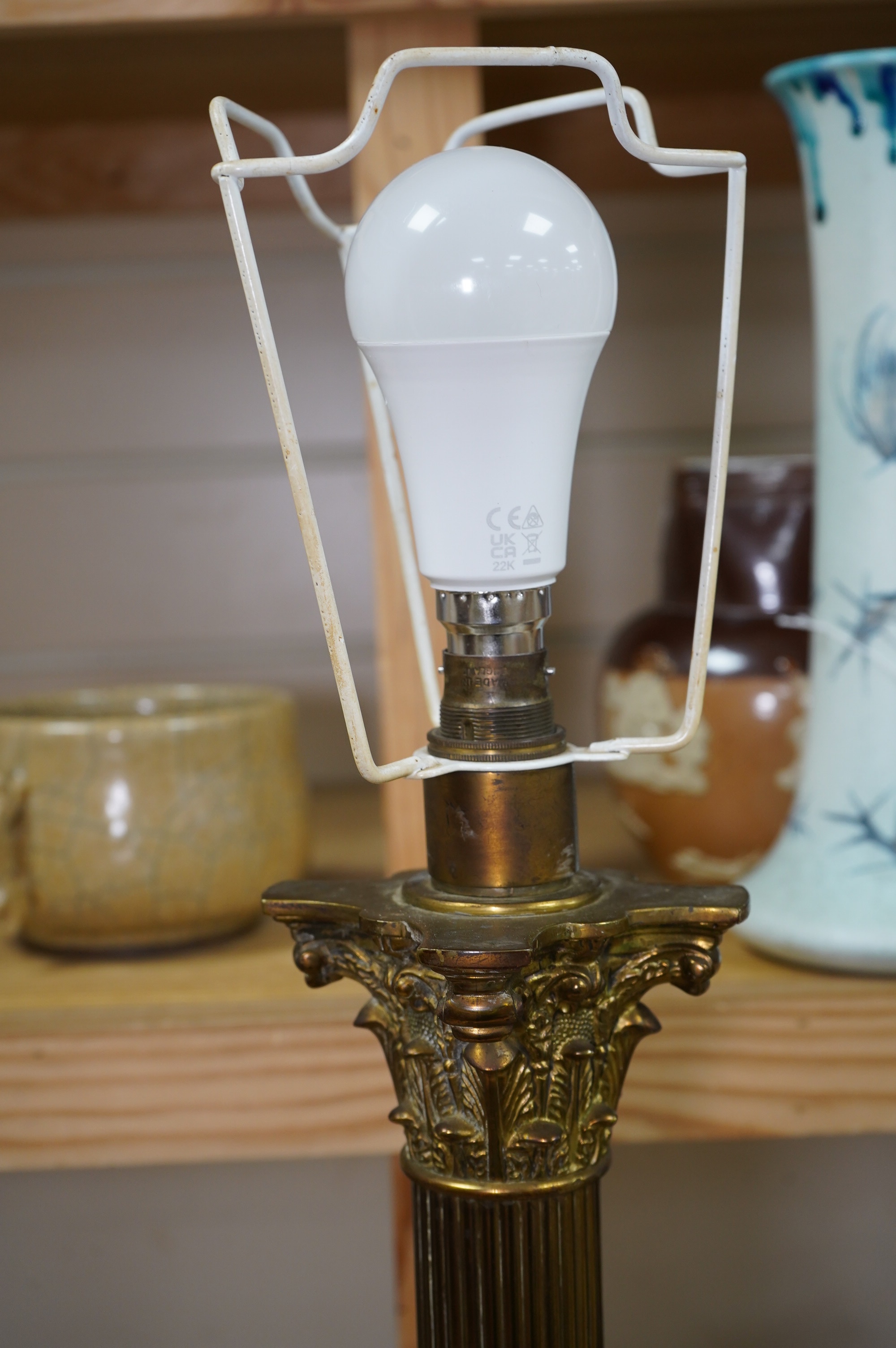 A brass Corinthian column table lamp, on pierced base, 54cm. Condition - fair to good